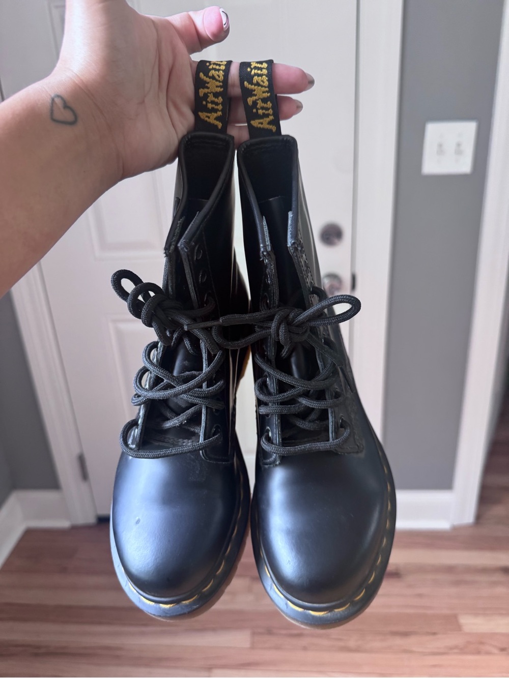 Dr. Martens Black Leather 8-Eye Lace-Up Combat Boots with Yellow Stitching